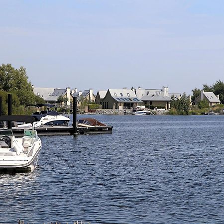 Modern Lodge On The Water In A National Park Tholen Bagian luar foto